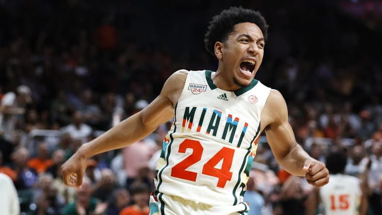 Feb 18, 2023; Coral Gables, Florida, USA; Miami Hurricanes guard Nijel Pack (24) reacts after dunking the basketball against the Wake Forest Demon Deacons during the second half at Watsco Center. Mandatory Credit: Sam Navarro-USA TODAY Sports