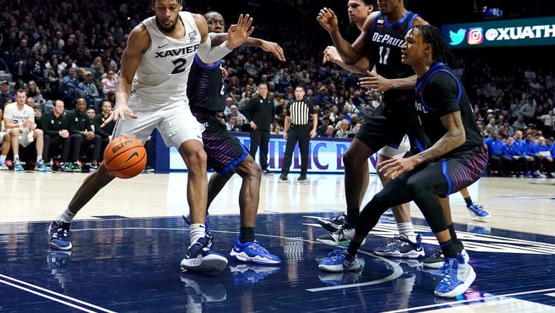 Xavier Musketeers forward Jerome Hunter (2) collects a rebound in the second half of a college basketball game between the DePaul Blue Demons and the Xavier Musketeers, Saturday, Feb. 18, 2023, at Cintas Center in Cincinnati.The Xavier Musketeers won, 82-68.

Depaul Blue Demons At Xavier Musketeers Feb 18 0259