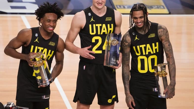 Feb 18, 2023; Salt Lake City, UT, USA; Team Jazz guard Collin Sexton (2), center Walker Kessler (24) and guard Jordan Clarkson (00) pose for a photo with their trophies after winning the Skills Competition during the 2023 All Star Saturday Night at Vivint Arena. Mandatory Credit: Kirby Lee-USA TODAY Sports