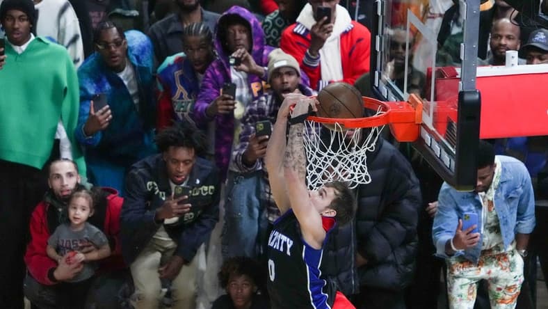 Feb 18, 2023; Salt Lake City, UT, USA; Philadelphia 76ers guard Mac McClung (9) dunks in the Dunk Contest during the 2023 All Star Saturday Night at Vivint Arena. Mandatory Credit: Kirby Lee-USA TODAY Sports