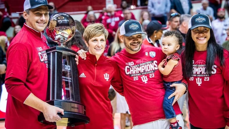 Indiana coaches, from left, Associate Head Coach Rhet Wierzba, Head Coach Teri Moren, Associate Head Coach Glenn Box, and Assistant Coach and Recruiting Coordinator Linda Sayavongchanh pose with the Big Ten Championship Trophy after the second half of the Indiana versus Purdue women's basketball game at Simon Skjodt Assembly Hall on Sunday, Feb. 19, 2023.

Iu Pu Wbb Pg Coaches Trophy Pose
