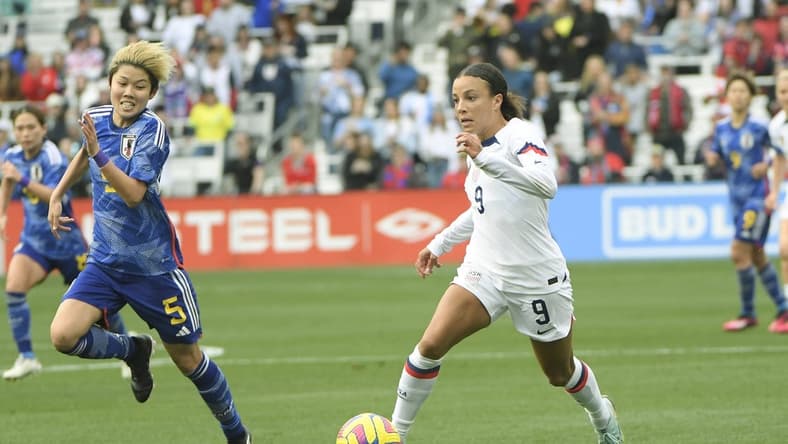 Feb 19, 2023; Nashville, Tennessee, USA;  United States of America forward Mallory Swanson (9) dribbles against the Japan during the first half at Geodis Park. Mandatory Credit: Steve Roberts-USA TODAY Sports