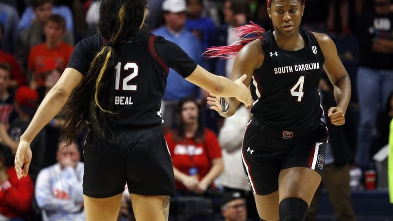 Feb 19, 2023; Oxford, Mississippi, USA; South Carolina Gamecocks forward Aliyah Boston (4) celebrates with South Carolina Gamecocks guard Brea Beal (12) after scoring a basket during the second half at The Sandy and John Black Pavilion at Ole Miss. Mandatory Credit: Petre Thomas-USA TODAY Sports