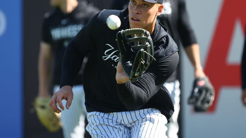 Feb 20, 2023; Tampa, FL, USA; New York Yankees center fielder Aaron Judge (99) works out during spring training practice at George M Steinbrenner Field. Mandatory Credit: Kim Klement-USA TODAY Sports