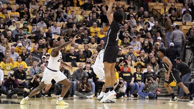 Feb 21, 2023; Columbia, Missouri, USA; Mississippi State Bulldogs forward Will McNair Jr. (13) shoots as Missouri Tigers guard Kobe Brown (24) defends during the first half at Mizzou Arena. Mandatory Credit: Denny Medley-USA TODAY Sports