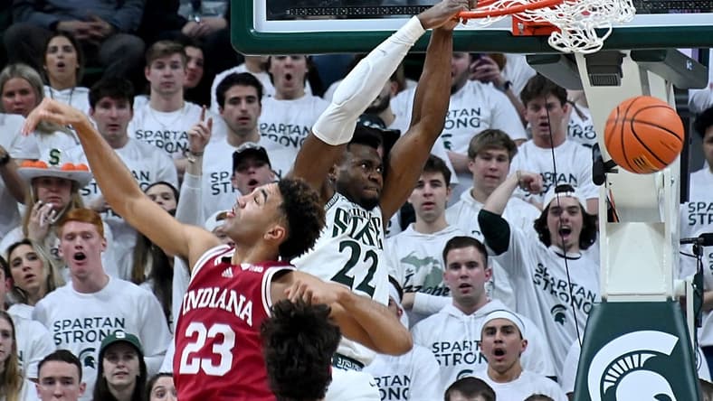 Feb 21, 2023; East Lansing, Michigan, USA; Michigan State Spartans center Mady Sissoko (22) dunks the ball past Indiana Hoosiers forward Trayce Jackson-Davis (23) in the first half at Jack Breslin Student Events Center. Mandatory Credit: Dale Young-USA TODAY Sports