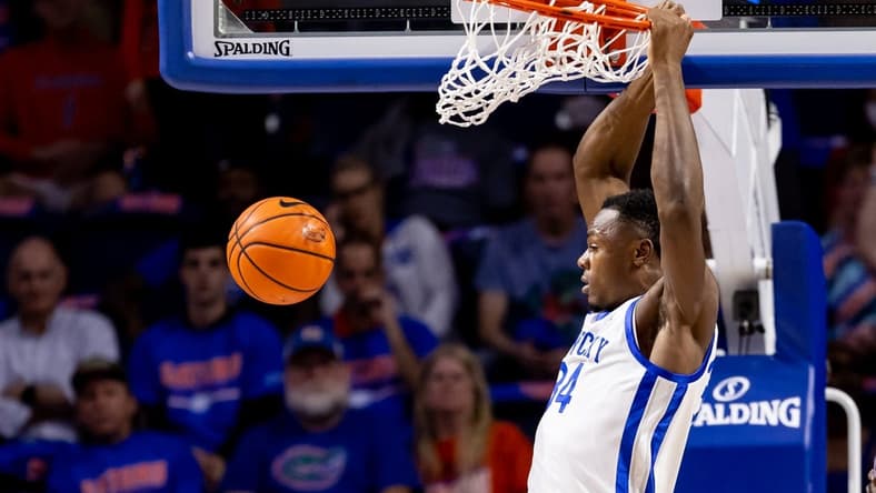 Feb 22, 2023; Gainesville, Florida, USA; Kentucky Wildcats forward Oscar Tshiebwe (34) dunks the ball during the first half against the Florida Gators at Exactech Arena at the Stephen C. O'Connell Center. Mandatory Credit: Matt Pendleton-USA TODAY Sports