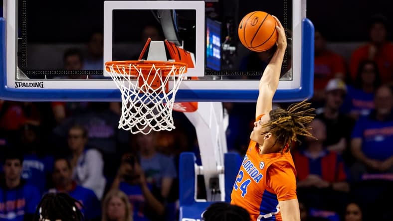 Feb 22, 2023; Gainesville, Florida, USA; Florida Gators guard Riley Kugel (24) dunks the ball during the second half against the Kentucky Wildcats at Exactech Arena at the Stephen C. O'Connell Center. Mandatory Credit: Matt Pendleton-USA TODAY Sports