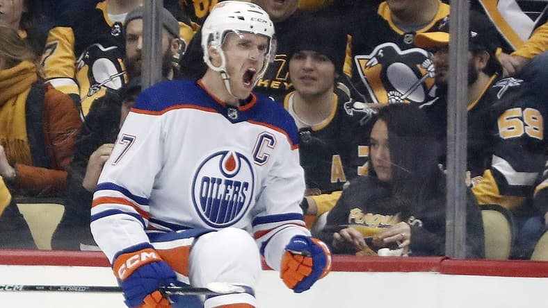 Feb 23, 2023; Pittsburgh, Pennsylvania, USA; Edmonton Oilers center Connor McDavid (97) reacts after scoring a goal against the Pittsburgh Penguins during the first period at PPG Paints Arena. Mandatory Credit: Charles LeClaire-USA TODAY Sports