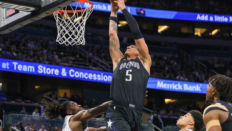 Feb 23, 2023; Orlando, Florida, USA; Orlando Magic forward Paolo Banchero (5) goes to the basket during the first quarter against the Detroit Pistons at Amway Center. Mandatory Credit: Mike Watters-USA TODAY Sports