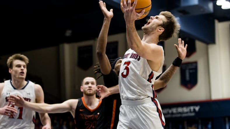 Feb 23, 2023; Moraga, California, USA;  St. Mary's Gaels guard Augustas Marciulionis (3) is fouled by Pacific Tigers guard Keylan Boone (20) during the first half at University Credit Union Pavilion. Mandatory Credit: John Hefti-USA TODAY Sports