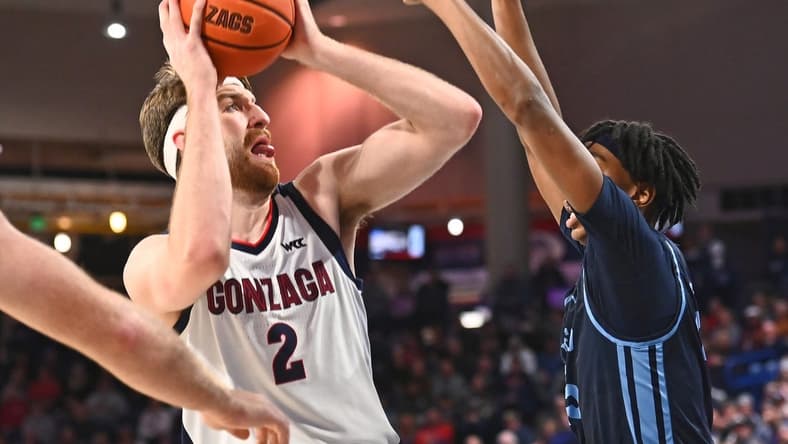 Feb 23, 2023; Spokane, Washington, USA; Gonzaga Bulldogs forward Drew Timme (2) shoots the ball against San Diego Toreros center Steven Jamerson II (25) in the first half at McCarthey Athletic Center. Mandatory Credit: James Snook-USA TODAY Sports