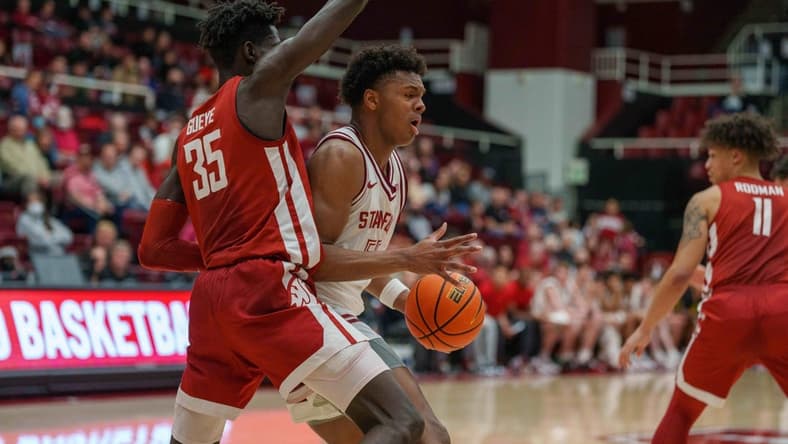 Feb 23, 2023; Stanford, California, USA;  Stanford Cardinal forward Harrison Ingram (55) drive to the net against Washington State Cougars forward Mouhamed Gueye (35) during the first half at Maples Pavilion. Mandatory Credit: Neville E. Guard-USA TODAY Sports