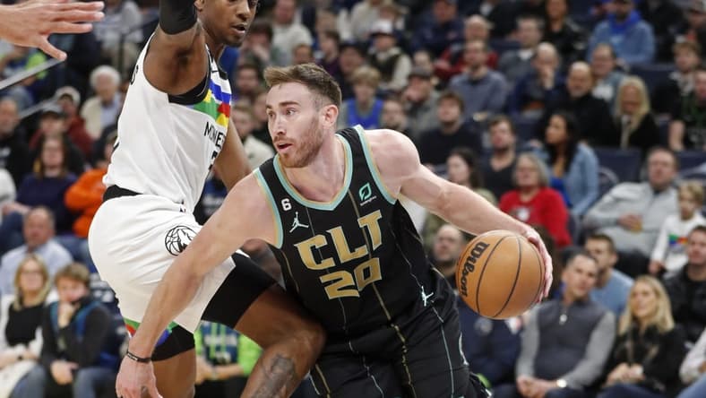 Feb 24, 2023; Minneapolis, Minnesota, USA; Charlotte Hornets forward Gordon Hayward (20) works around Minnesota Timberwolves forward Jaden McDaniels (3) in the first quarter at Target Center. Mandatory Credit: Bruce Kluckhohn-USA TODAY Sports