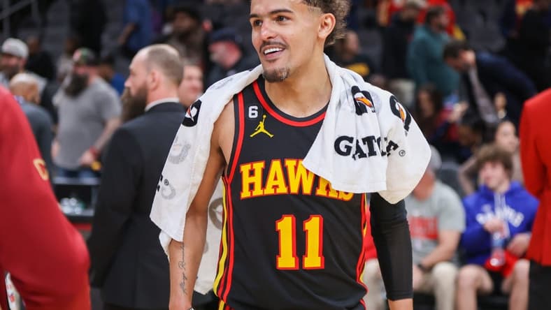 Feb 24, 2023; Atlanta, Georgia, USA; Atlanta Hawks guard Trae Young (11) celebrates after a victory against the Cleveland Cavaliers at State Farm Arena. Mandatory Credit: Brett Davis-USA TODAY Sports