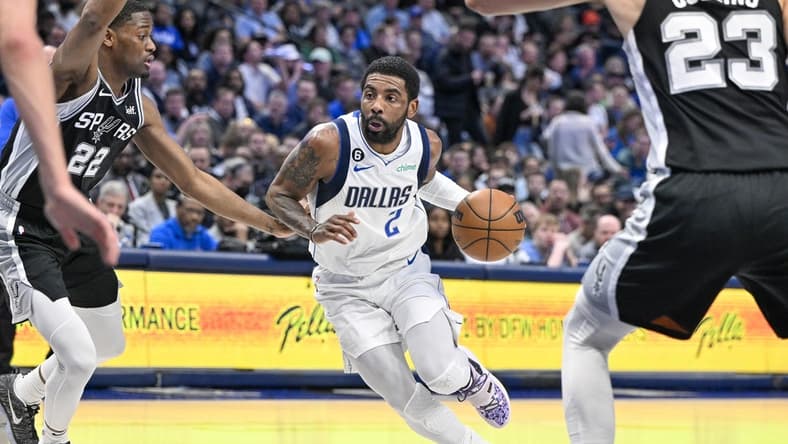Feb 23, 2023; Dallas, Texas, USA; Dallas Mavericks guard Kyrie Irving (2) in action during the game between the Dallas Mavericks and the San Antonio Spurs at American Airlines Center. Mandatory Credit: Jerome Miron-USA TODAY Sports