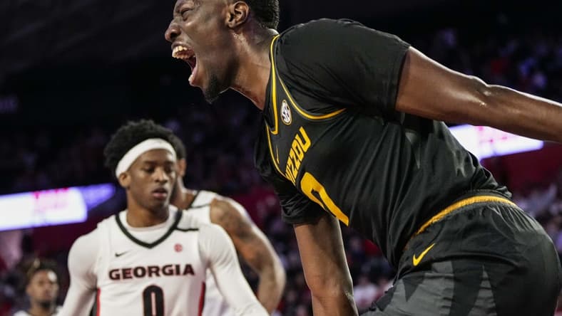 Feb 25, 2023; Athens, Georgia, USA; Missouri Tigers forward Mohamed Diarra (0) reacts after dunking against the Georgia Bulldogs during the first half at Stegeman Coliseum. Mandatory Credit: Dale Zanine-USA TODAY Sports