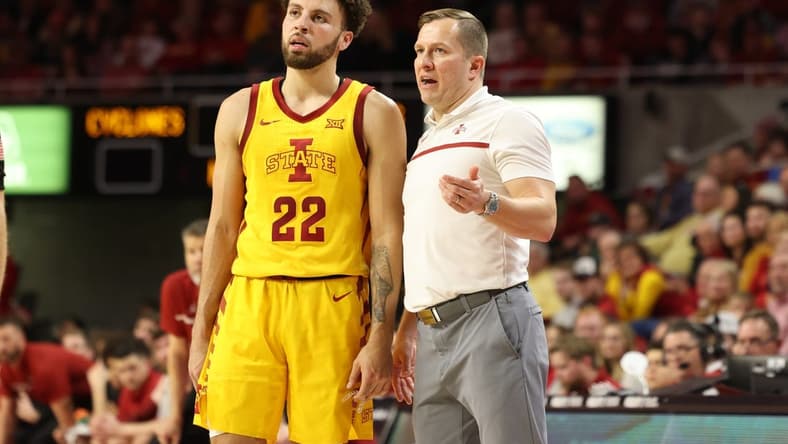 Feb 25, 2023; Ames, Iowa, USA; Iowa State Cyclones head coach T.J. Otzelberger talks to guard Gabe Kalscheur (22) during their game with the Oklahoma Sooners in the second half at James H. Hilton Coliseum. Mandatory Credit: Reese Strickland-USA TODAY Sports