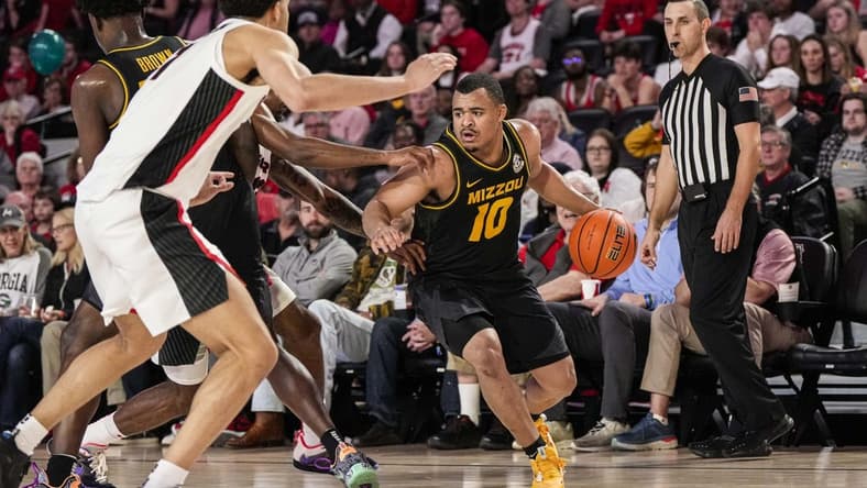Feb 25, 2023; Athens, Georgia, USA; Missouri Tigers guard Nick Honor (10) dribbles against the Georgia Bulldogs during the first half at Stegeman Coliseum. Mandatory Credit: Dale Zanine-USA TODAY Sports