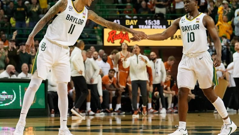Feb 25, 2023; Waco, Texas, USA;  Baylor Bears forward Jalen Bridges (11) and Baylor Bears guard Adam Flagler (10) celebrates after a play against the Texas Longhorns during the second half at Ferrell Center. Mandatory Credit: Chris Jones-USA TODAY Sports