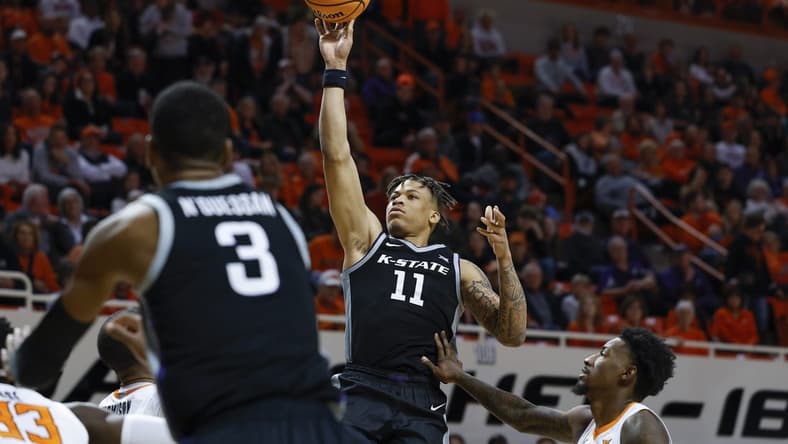 Feb 25, 2023; Stillwater, Oklahoma, USA; Kansas State Wildcats forward Keyontae Johnson (11) shoots against the Oklahoma State Cowboys during the second half at Gallagher-Iba Arena. Kansas State won 73-68. Mandatory Credit: Alonzo Adams-USA TODAY Sports