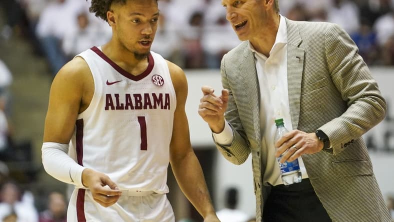 Feb 25, 2023; Tuscaloosa, Alabama, USA; Alabama Crimson Tide guard Mark Sears (1) talks to head coach Nate Oats during the second half against the Arkansas Razorbacks at Coleman Coliseum. Mandatory Credit: Marvin Gentry-USA TODAY Sports