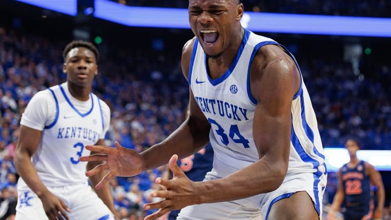 Feb 25, 2023; Lexington, Kentucky, USA; Kentucky Wildcats forward Oscar Tshiebwe (34) reacts after losing a rebound out of bounds during the first half against the Auburn Tigers at Rupp Arena at Central Bank Center. Mandatory Credit: Jordan Prather-USA TODAY Sports