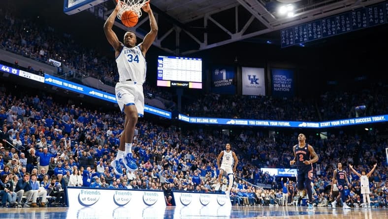 Feb 25, 2023; Lexington, Kentucky, USA; Kentucky Wildcats forward Oscar Tshiebwe (34) dunks the ball during the second half against the Auburn Tigers at Rupp Arena at Central Bank Center. Mandatory Credit: Jordan Prather-USA TODAY Sports