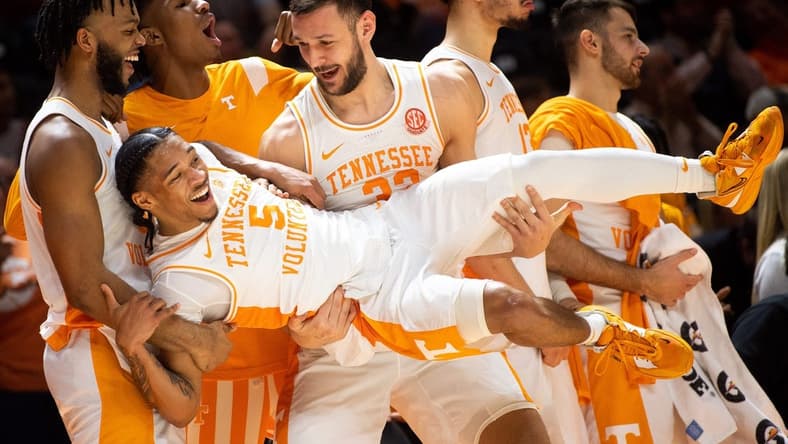 Tennessee forward Uros Plavsic (33) picks up Tennessee guard Zakai Zeigler (5) off the ground in celebration during a NCAA college basketball game between the Tennessee Volunteers and the South Carolina Gamecocks at Thompson-Boling Arena in Knoxville, Tenn. on Saturday, February 25, 2023.
Kns Vols Hoops South Carolina Bp