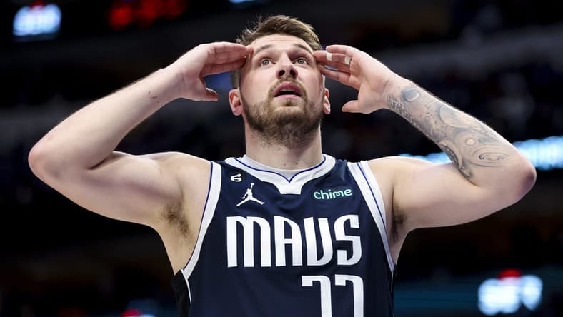 Feb 26, 2023; Dallas, Texas, USA; Dallas Mavericks guard Luka Doncic (77) reacts during the fourth quarter against the Los Angeles Lakers at American Airlines Center. Mandatory Credit: Kevin Jairaj-USA TODAY Sports
