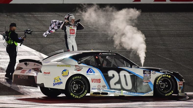 Feb 26, 2023; Fontana, California, USA; Xfinity Cup Series driver John Hunter Nemechek (20) celebrates his victory of the Series Production Alliance Group 300 at Auto Club Speedway. Mandatory Credit: Gary A. Vasquez-USA TODAY Sports