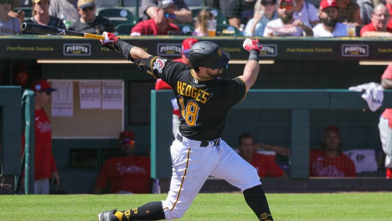 Feb 27, 2023; Bradenton, Florida, USA; Pittsburgh Pirates catcher Austin Hedges (18) bats against the Philadelphia Phillies during the third inning against the Philadelphia Phillies at LECOM Park. Mandatory Credit: Mike Watters-USA TODAY Sports