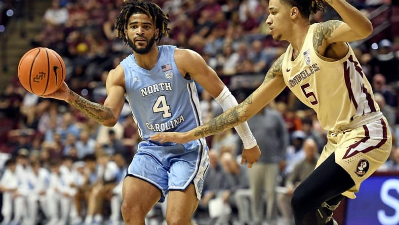 Feb 27, 2023; Tallahassee, Florida, USA; North Carolina Tar Heels guard RJ Davis (4) passes the ball during the first half against the Florida State Seminoles at Donald L. Tucker Center. Mandatory Credit: Melina Myers-USA TODAY Sports