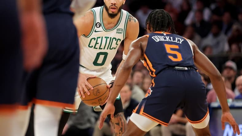 Feb 27, 2023; New York, New York, USA; Boston Celtics forward Jayson Tatum (0) controls the ball against New York Knicks guard Immanuel Quickley (5) during the second quarter at Madison Square Garden. Mandatory Credit: Brad Penner-USA TODAY Sports