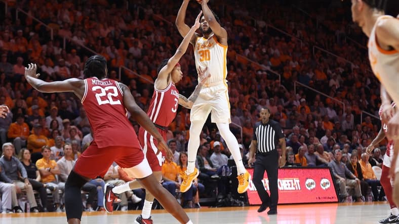 Feb 28, 2023; Knoxville, Tennessee, USA; Tennessee Volunteers guard Josiah-Jordan James (30) shoots the ball against the Arkansas Razorbacks during the first half at Thompson-Boling Arena. Mandatory Credit: Randy Sartin-USA TODAY Sports