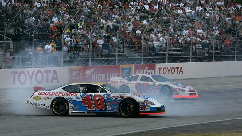 Car number 40 driven by Scott Lagasse Jr. goes sideways on turn 4 on lap 22 after car number 66 driven by Aaron Fike lost control on turn 4 during the Nascar Busch series SBC 250 at the Milwaukee Mile in West Allis Saturday, June 25, 2005. (Photo by David Joles)
Race26 Race26sptjoles2 Of Sev