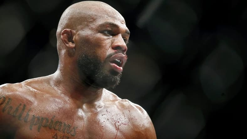 Feb 8, 2020; Houston, Texas, USA; Jon Jones (red gloves) fights Dominick Reyes (not pictured) during UFC 247 at Toyota Center. Mandatory Credit: Thomas Shea-USA TODAY Sports