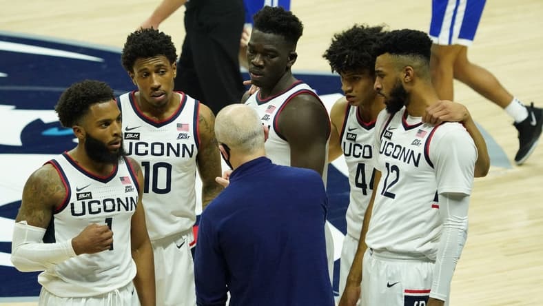 Nov 25, 2020; Storrs, CT, USA; Connecticut Huskies head coach Dan Hurley talks to guard R.J. Cole (1) and guard Brendan Adams (10) and forward Adama Sanogo (middle top) and guard Andre Jackson (44) and forward Tyler Polley (12) during a break in the action against the Central Connecticut State Blue Devils in the second half at Gampel Pavilion. Mandatory Credit: David Butler II-USA TODAY Sports