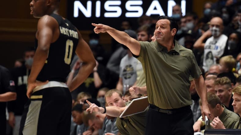 Nov 12, 2021; Durham, North Carolina, USA; Army Black Knights head coach Jimmy Allen (right) directs his team during the first half against the Duke Blue Devils at Cameron Indoor Stadium. Mandatory Credit: Rob Kinnan-USA TODAY Sports