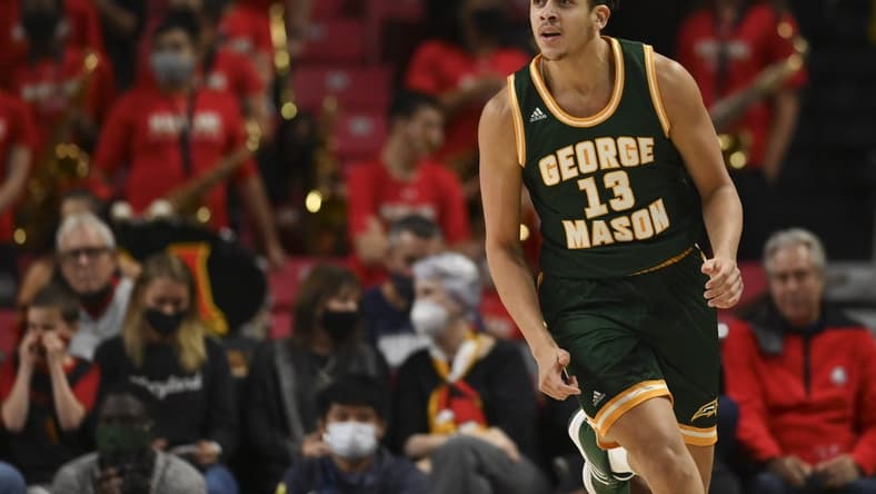 Nov 17, 2021; College Park, Maryland, USA; George Mason Patriots forward Josh Oduro (13) reacts after making a basket during the second half against the Maryland Terrapins at Xfinity Center. Mandatory Credit: Tommy Gilligan-USA TODAY Sports