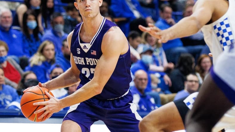 Dec 31, 2021; Lexington, Kentucky, USA; High Point Panthers forward Rob Peterson III (22) handles the ball during the first half against the Kentucky Wildcats at Rupp Arena at Central Bank Center. Mandatory Credit: Jordan Prather-USA TODAY Sports