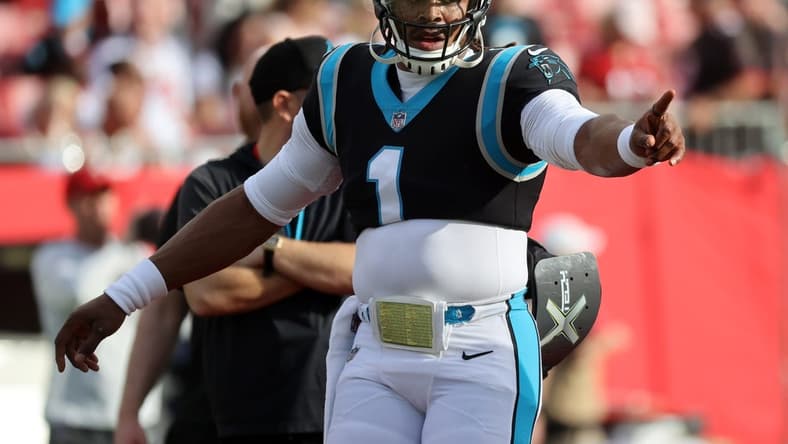 Jan 9, 2022; Tampa, Florida, USA;Carolina Panthers quarterback Cam Newton (1) against the Tampa Bay Buccaneers prior to the game at Raymond James Stadium. Mandatory Credit: Kim Klement-USA TODAY Sports