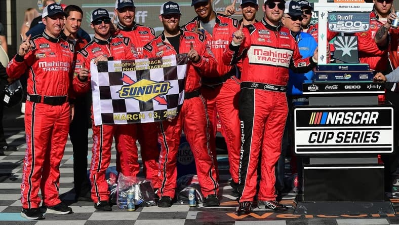 Mar 13, 2022; Avondale, Arizona, USA; NASCAR Cup Series driver Chase Briscoe (14) celebrates his victory of the Ruoff Mortgage 500 at Phoenix Raceway. Mandatory Credit: Gary A. Vasquez-USA TODAY Sports