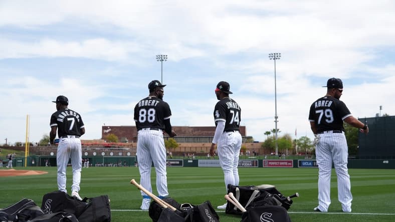 Mar 19, 2022; Phoenix, Arizona, USA; Chicago White Sox shortstop Tim Anderson (7) and Chicago White Sox outfielder Luis Rober (88) and Chicago White Sox left fielder Eloy Jiminez (74) and Chicago White Sox first baseman Jose Abreu (79) look on prior to a spring training game against the Cleveland Guardians at Camelback Ranch-Glendale. Mandatory Credit: Joe Camporeale-USA TODAY Sports