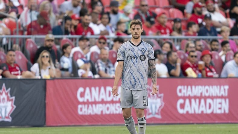 Jun 22, 2022; Toronto, Ontario, CAN; CF Montreal defender Gabriele Corbo (5) controls the ball against Toronto FC during the second half of the Canadian Championship semifinal at BMO Field. Mandatory Credit: Nick Turchiaro-USA TODAY Sports