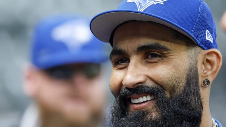 Jul 8, 2022; Seattle, Washington, USA; Toronto Blue Jays relief pitcher Sergio Romo (54) talks with teammates before batting practice against the Seattle Mariners at T-Mobile Park. Mandatory Credit: Joe Nicholson-USA TODAY Sports