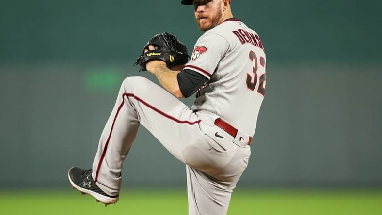 Aug 23, 2022; Kansas City, Missouri, USA; Arizona Diamondbacks relief pitcher Chris Devenski (32) warms up during the eighth inning against the Kansas City Royals at Kauffman Stadium. Mandatory Credit: Jay Biggerstaff-USA TODAY Sports