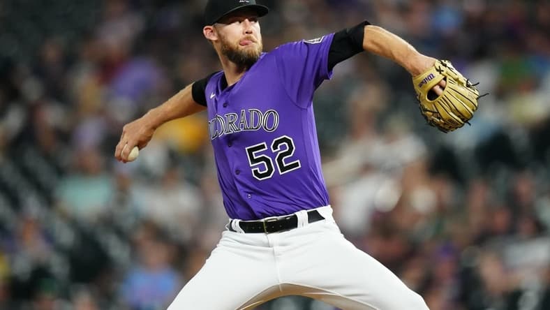 Sep 6, 2022; Denver, Colorado, USA; Colorado Rockies relief pitcher Daniel Bard (52) pitches in the eleventh inning against the Milwaukee Brewers at Coors Field. Mandatory Credit: Ron Chenoy-USA TODAY Sports
