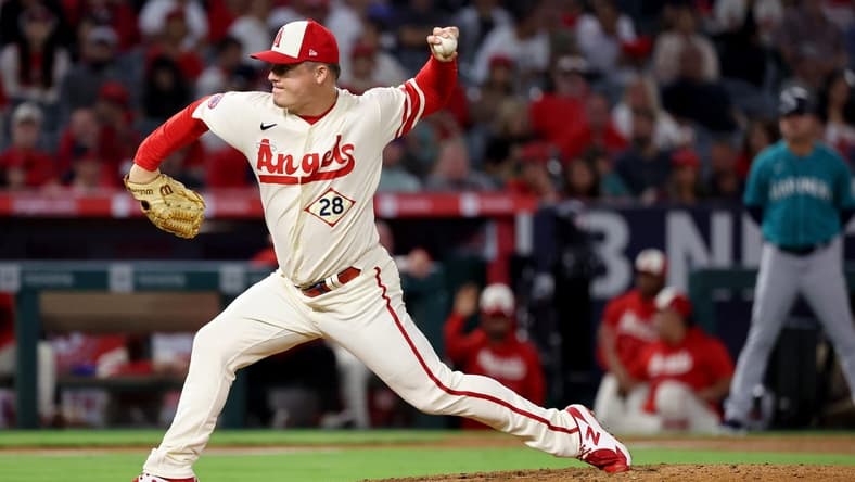 Sep 17, 2022; Anaheim, California, USA;  Los Angeles Angels relief pitcher Aaron Loup (28) pitches during the ninth inning against the Seattle Mariners at Angel Stadium. Mandatory Credit: Kiyoshi Mio-USA TODAY Sports