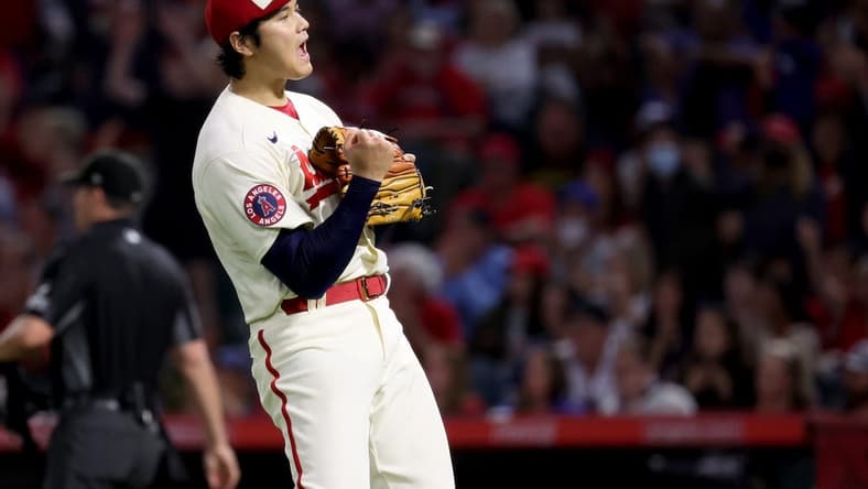 Sep 17, 2022; Anaheim, California, USA; Los Angeles Angels starting pitcher Shohei Ohtani (17) reacts after Seattle Mariners player Adam Frazier hit into a double play during the seventh inning of a baseball game at Angel Stadium. Mandatory Credit: Kiyoshi Mio-USA TODAY Sports